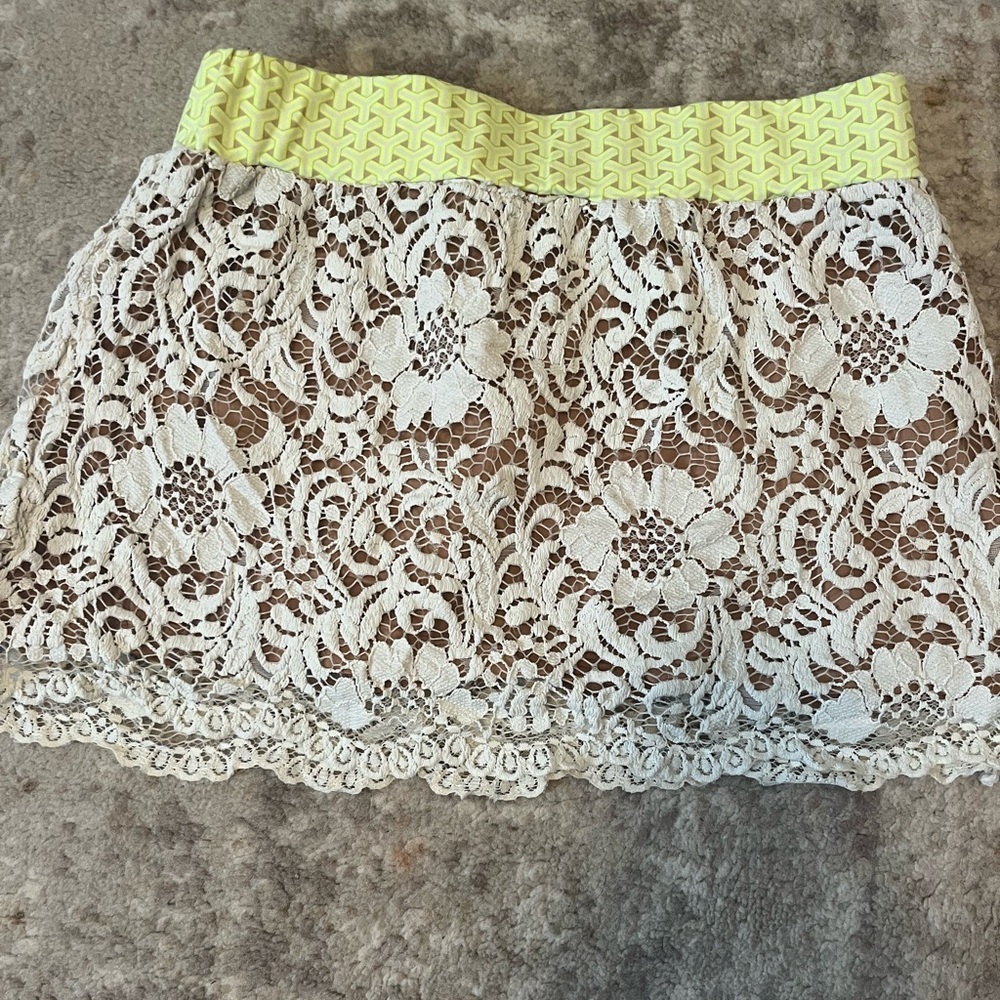 Maaji mini skirt white lace with neon details. Size S